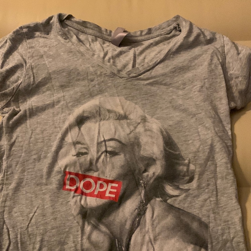 A grey v-neck shirt